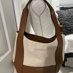 Michael Kors, canvas and leather, three pocket shoulder bag.